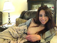 Brunette solo masturbation on the couch