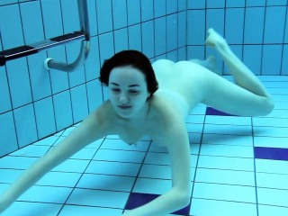 Lada Poleshuk underwater show big tits short hair