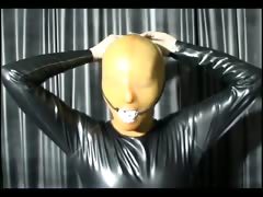 Lovely girl in latex mask posing