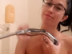 Hot brunette babe Samantha Bentley solo shower strip tease